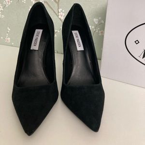 Women’s black suede pump.